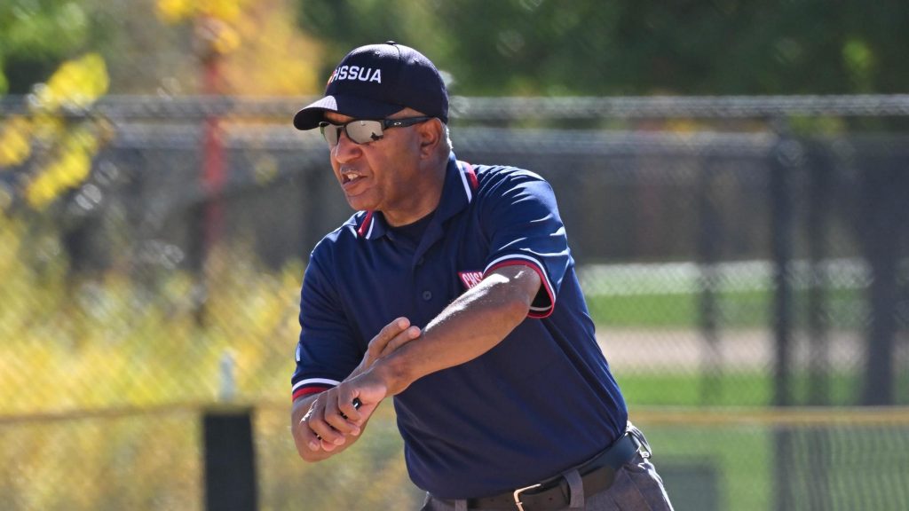 Tony Exum officiating state softball