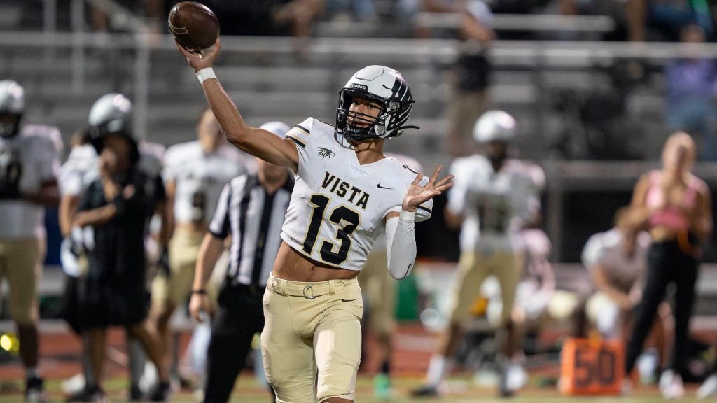 Austin Modrzewski passing the football
