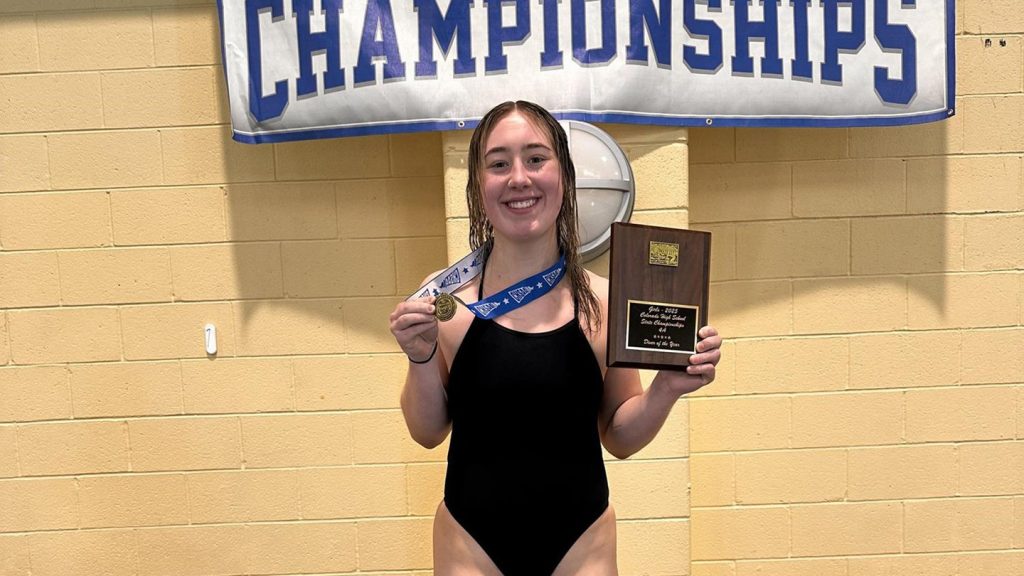 Izzy Fay after winning the 4A Diving Championship