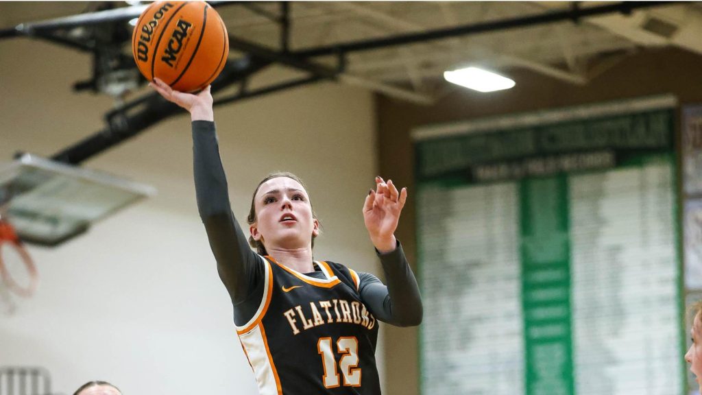 Annabelle Rakers of Flatirons Academy shoots a layup