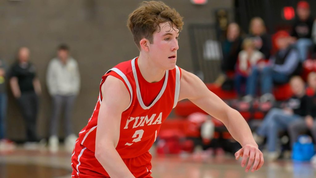 Brody Sheffield of Yuma dribbles