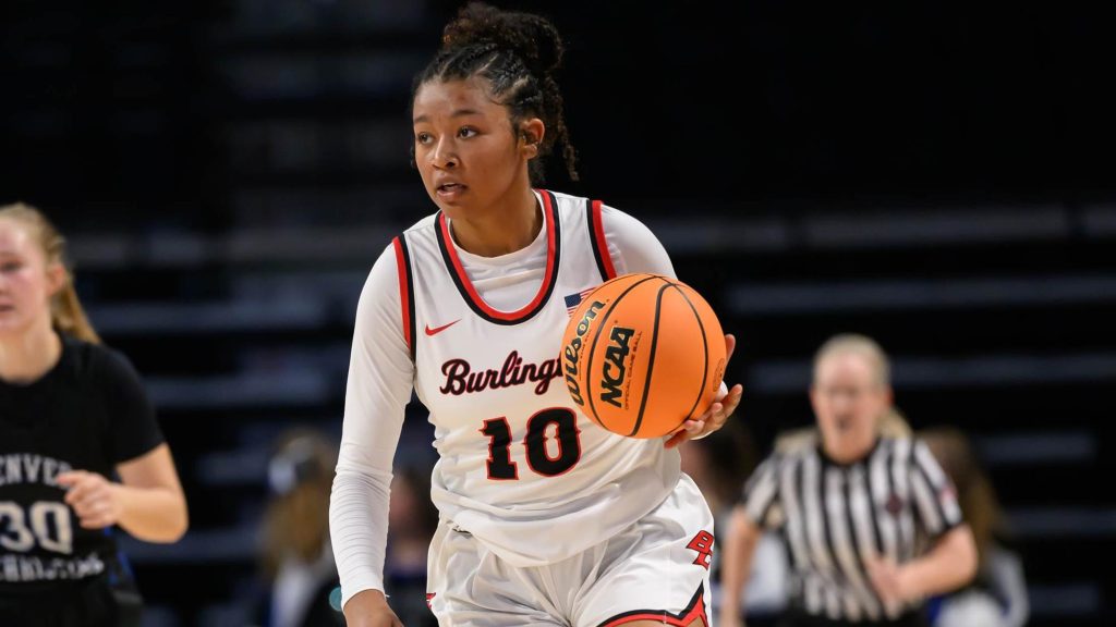 Kiyarra Williams of Burlington dribbles.