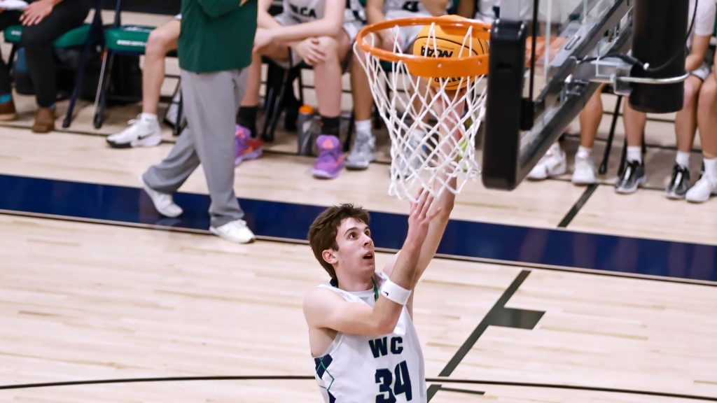 Andrew Schams of Windsor Charter Academy shoots a layup