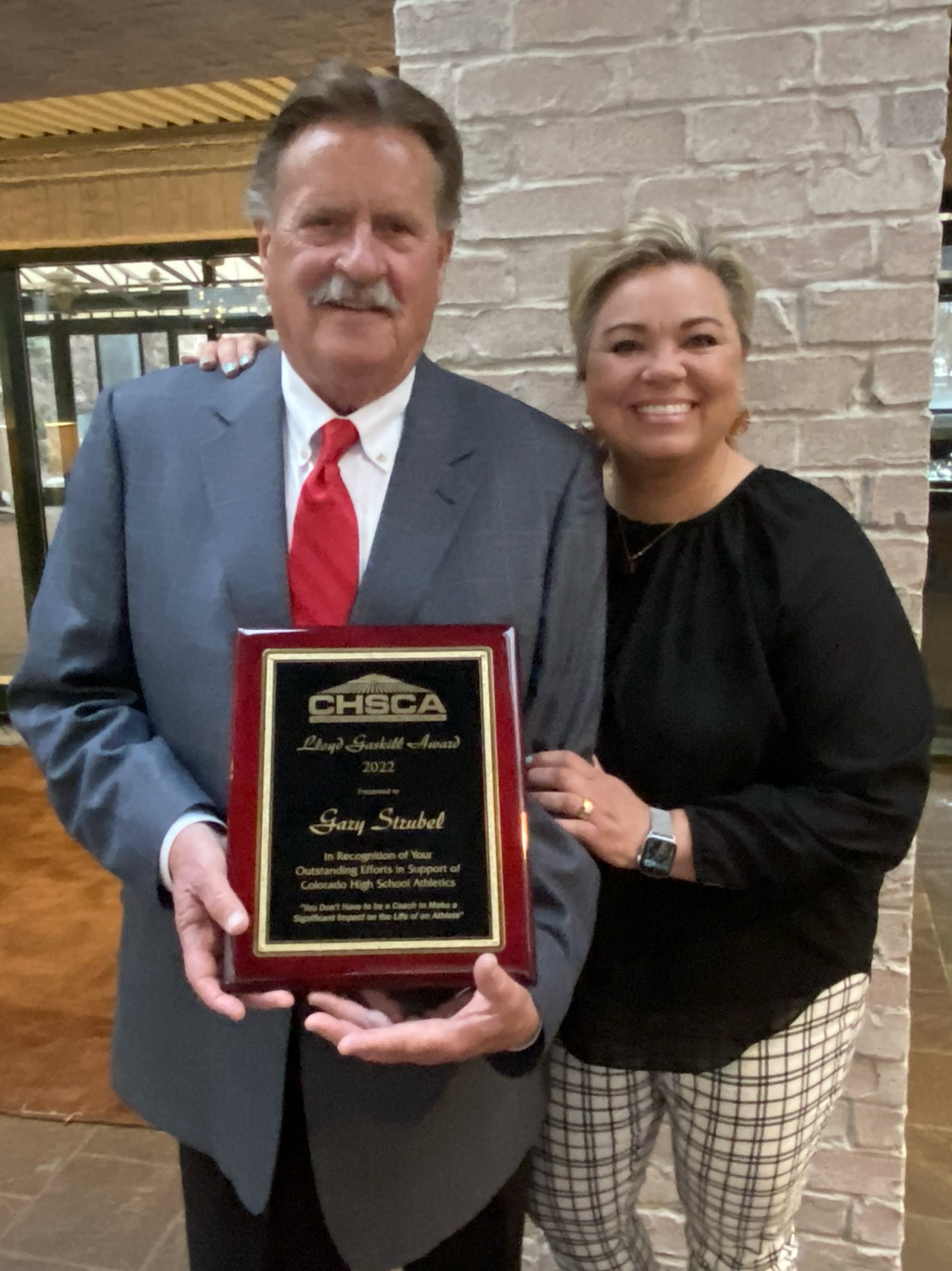 Gary Strubel with CHSAA Assistant Commissioner Jenn Roberts Uhlig