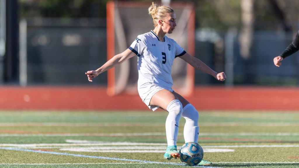 Grace Waters of Columbine playing soccer.