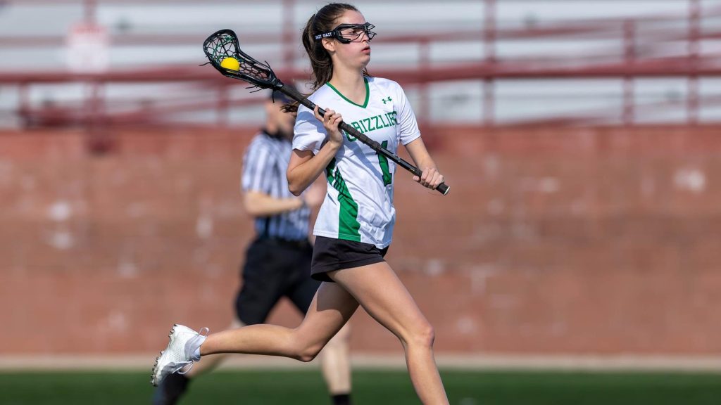 Riley Rivera of ThunderRidge playing lacrosse