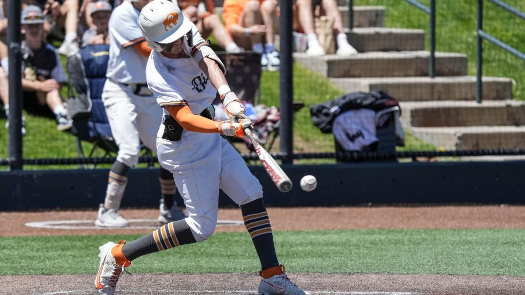 Caleb Doughty of Flatirons Academy hitting a baseball