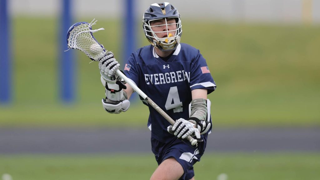 William Wales of Evergreen playing lacrosse