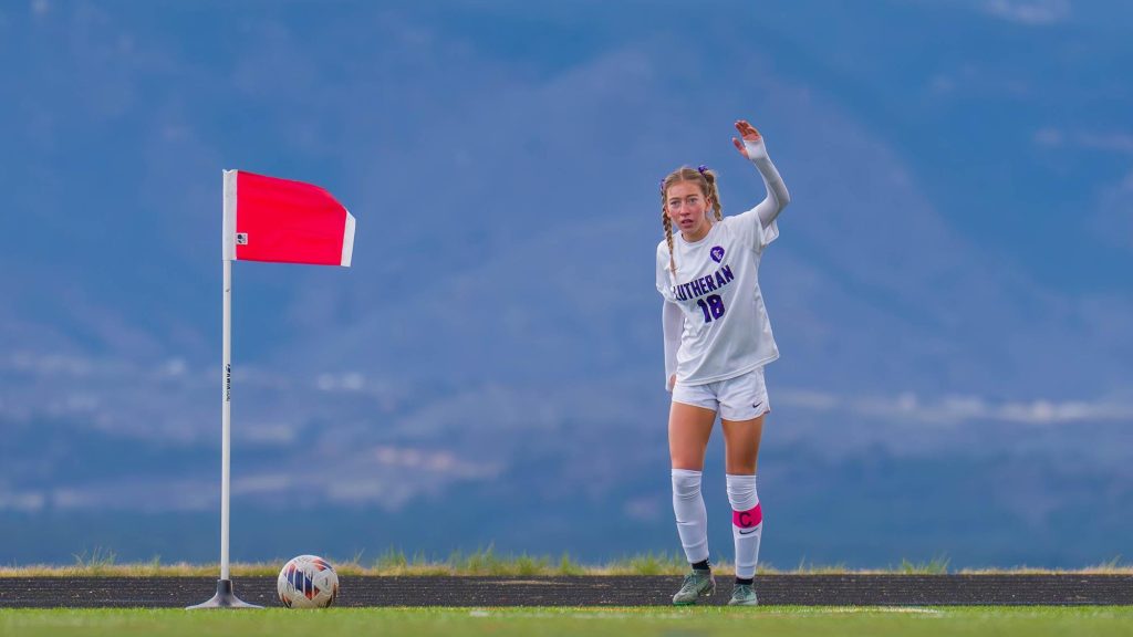 Lillyaunna Norden of Lutheran playing soccer