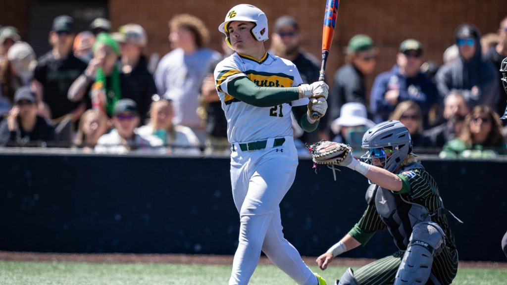 Pat Noga of Pueblo County follows through on his baseball swing.