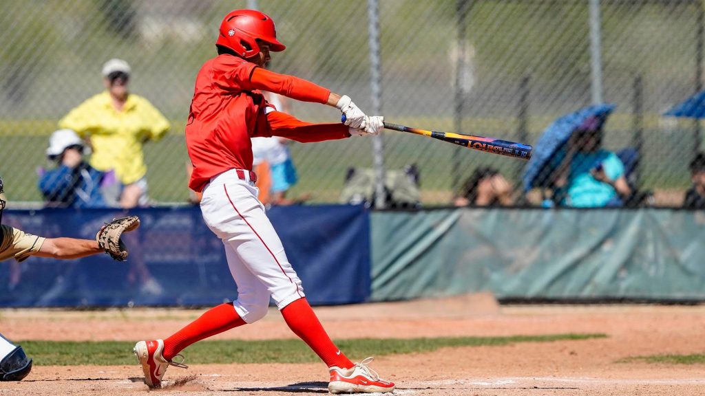 Christian Lopez of Regis Jesuit swings in baseball
