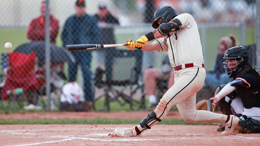 Ethan Fillinger of Windsor, hitting a baseball
