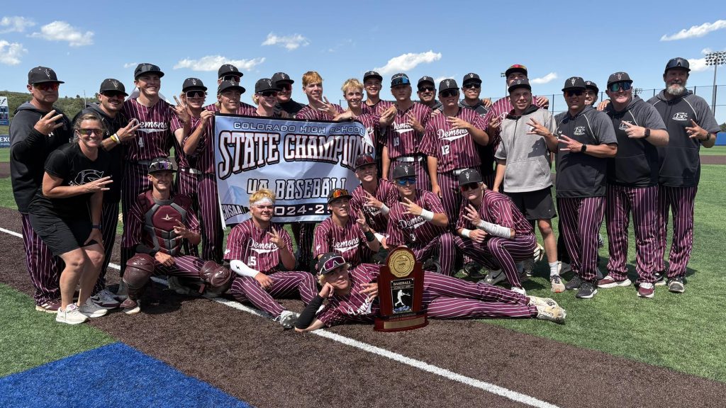 Golden team photo after winning the 4A state baseball championship