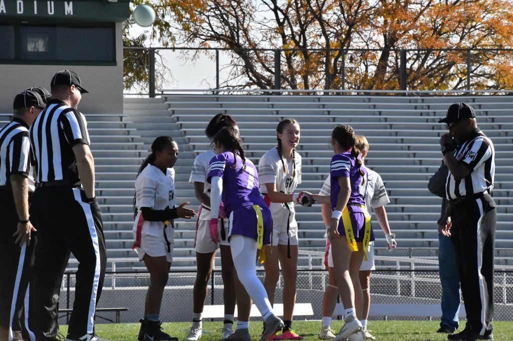 Flag football captains meeting with officials