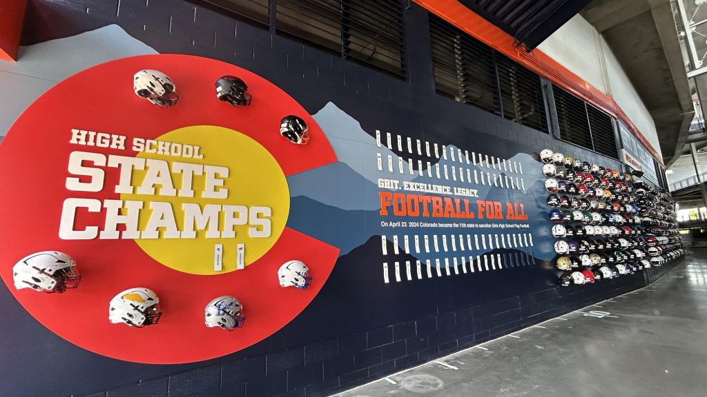 Denver Broncos High School Flag and Helmet Wall