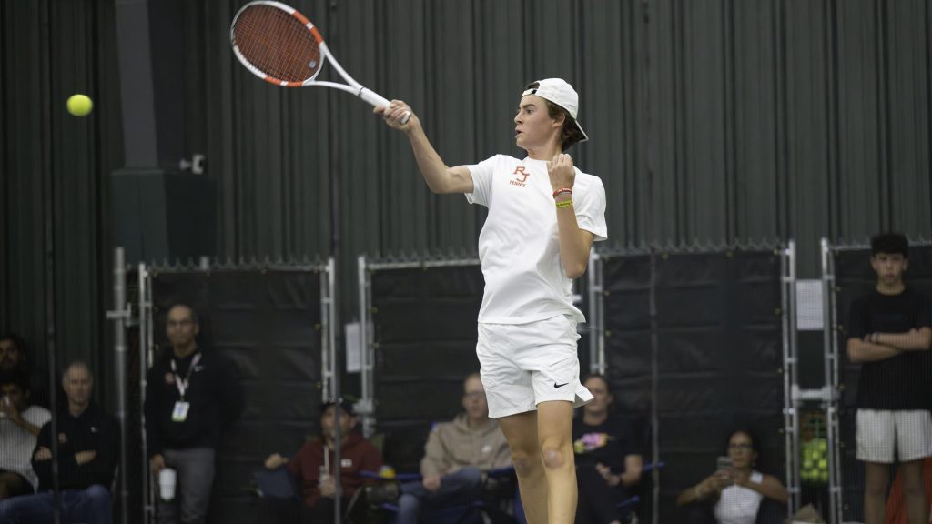 Alec Rodriguez-Fields hits a forehand at the 2024 CHSAA boys state tennis tournament.