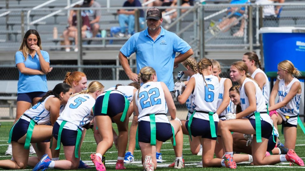 Ralston Valley's Greg Johnson talks to his team at a flag football game