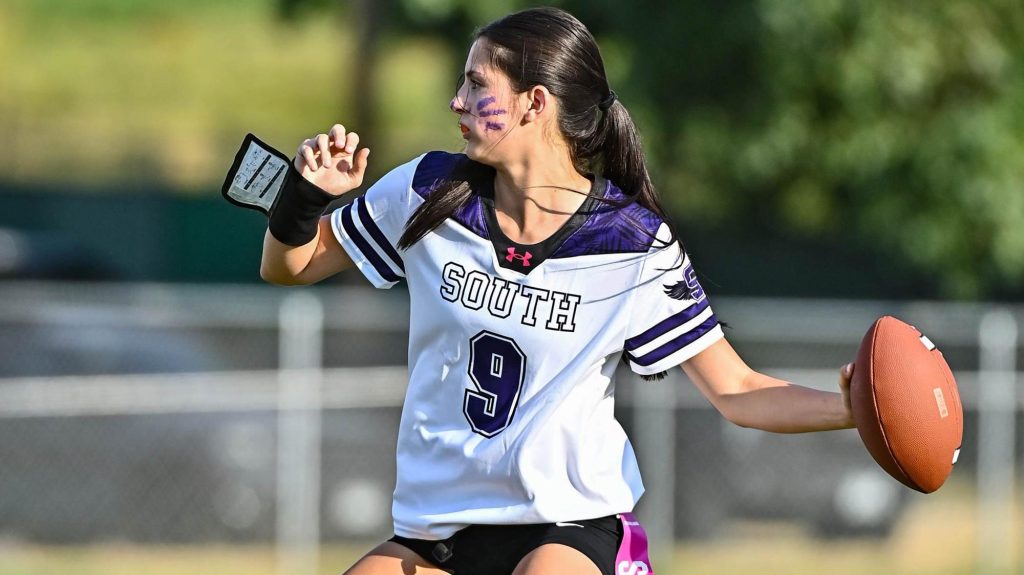 Iris Duran of Denver South about to make a pass in a flag football game