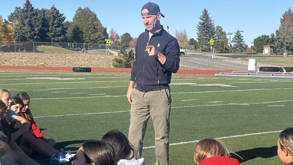 Chaparral flag football coach Lance Petrillo talks to his team