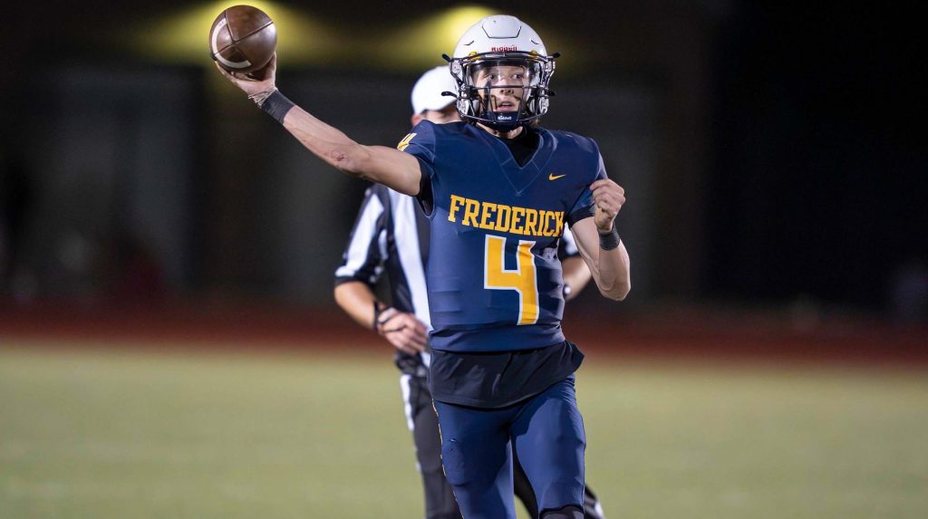 Preston Kissinger of Frederick passing the football
