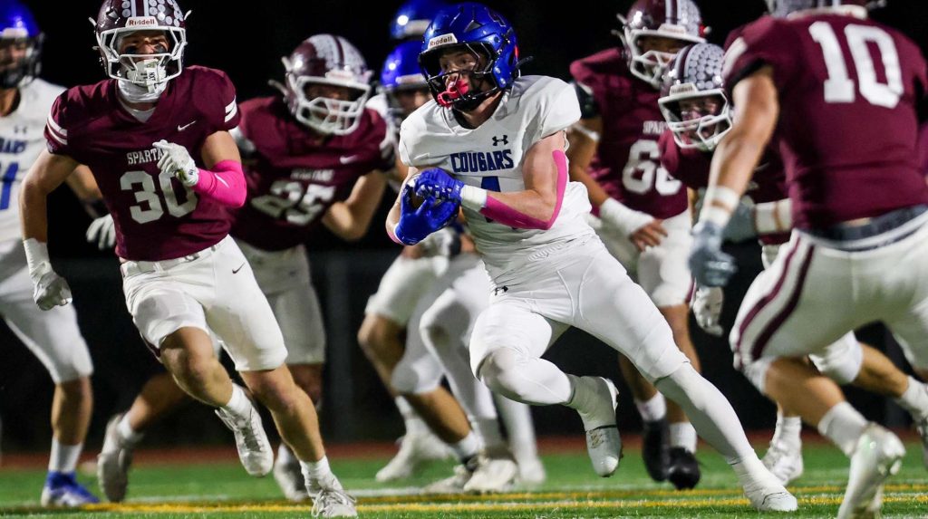 Resurrection Christian running back Britton Walston runs with the ball