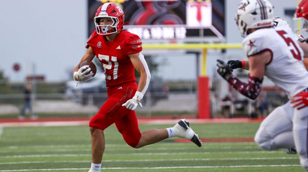 Eaton's Jackson Savona running with the football