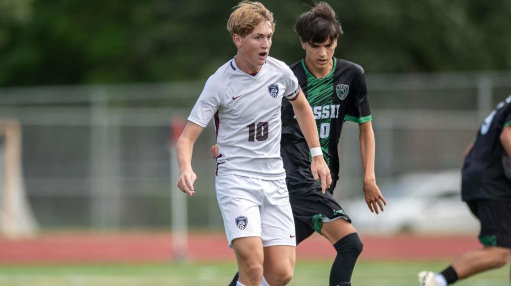 Caleb Burgess of Cherokee Trail playing soccer