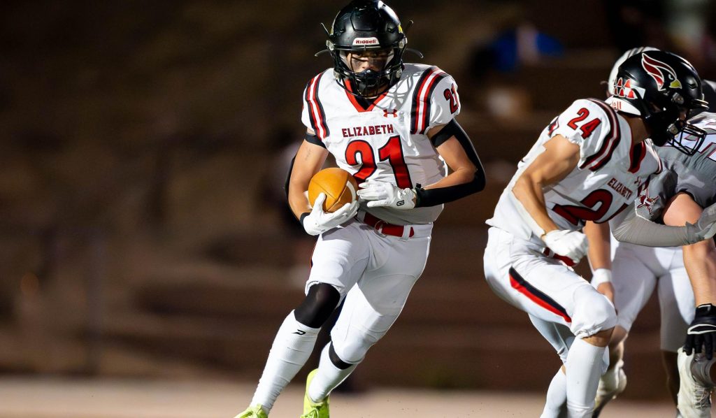Tristan McCray of Elizabeth running with the football