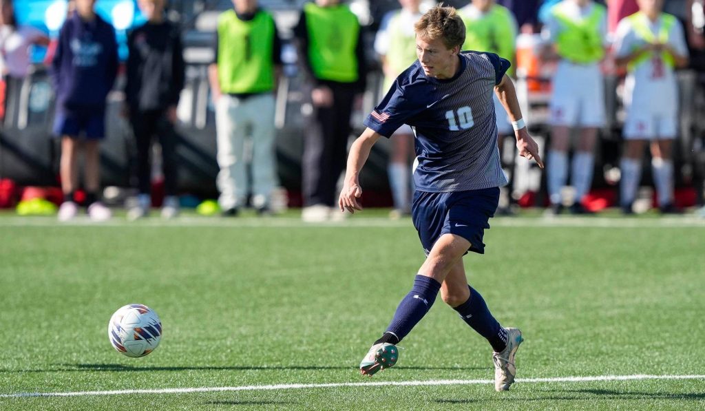 Crested Butte's Shawn Moran follows through after passing a soccer ball