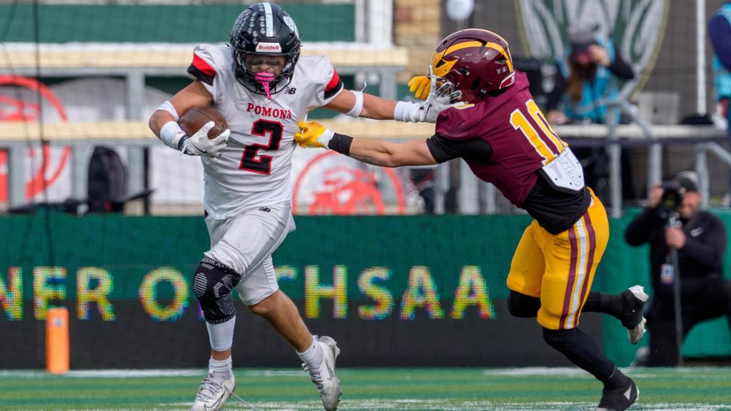 Luis Santana of Pomona running with the football