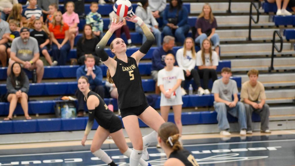 Logan Cary of Rock Canyon setting the volleyball