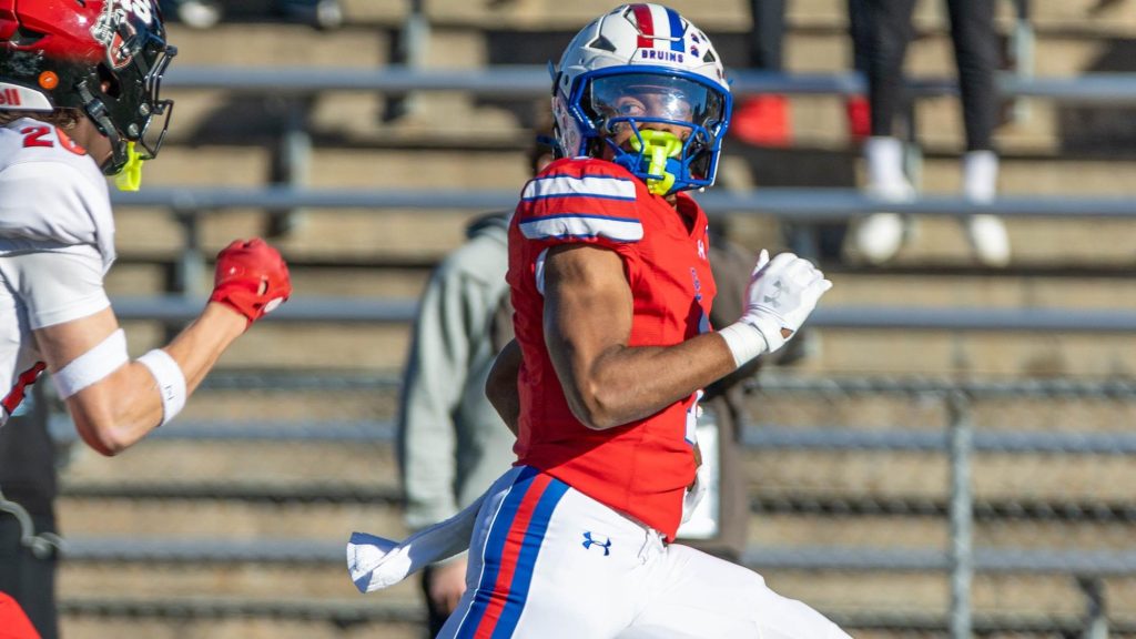 Cherry Creek's Jayden Fox running with the football