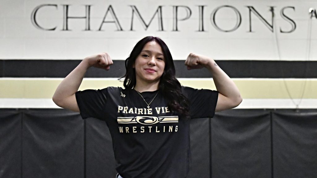 Prairie View wrestler Jaydin Cuevas flexes