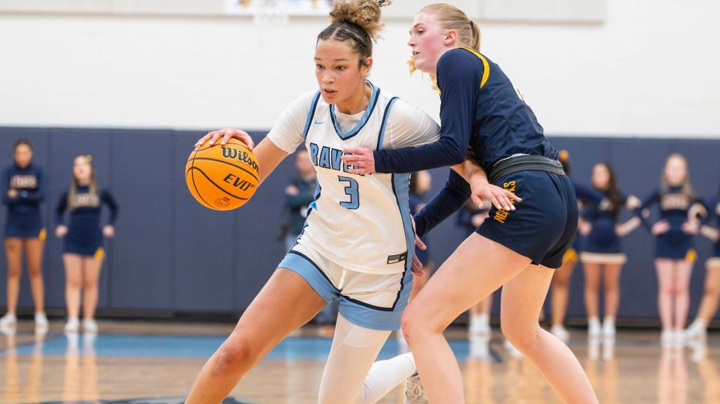 Brihanna Crittendon of Riverdale Ridge drives with the basketball