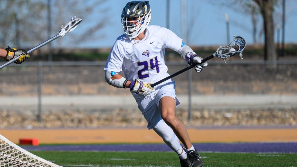 Rocco Bertagnolli of Holy Family playing lacrosse