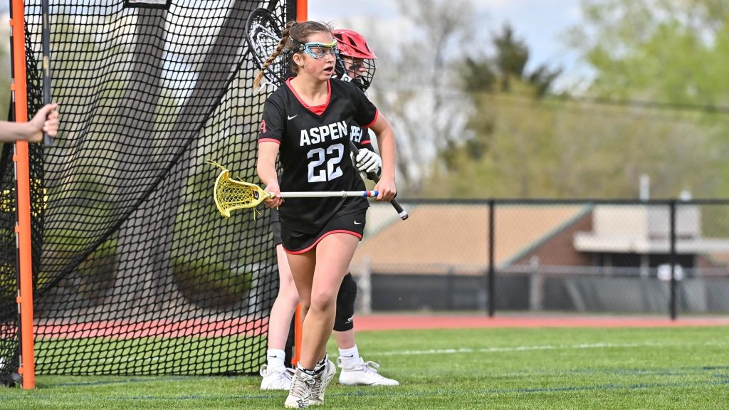 Aspen's Gigi Trani playing lacrosse