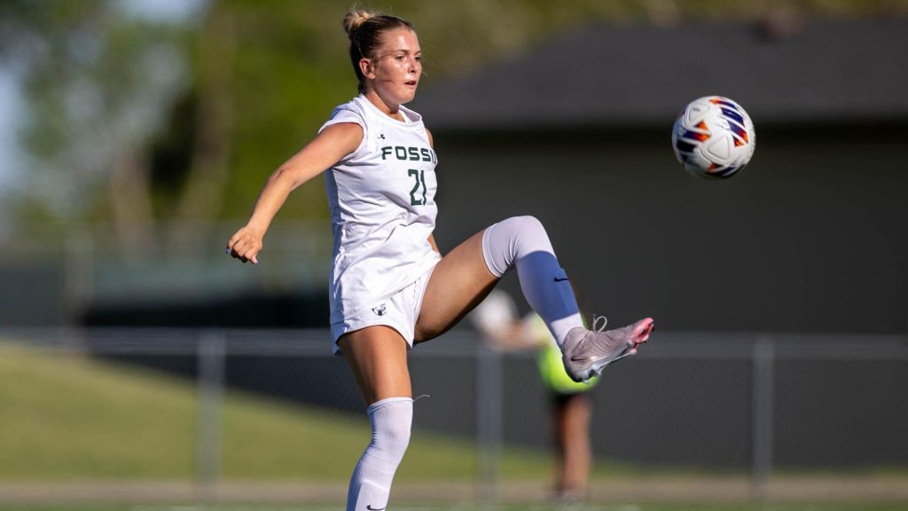 Lily Wale of Fossil Ridge playing soccer
